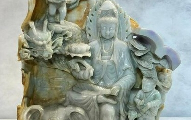 Intricately carved fine lavender jade depicting Kwan