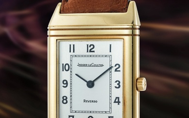 Jaeger-LeCoultre, Ref. 140.105.1 An attractive yellow gold reversible quartz wristwatch with guarantee
