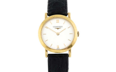 LONGINES - an 18ct yellow gold wrist watch, 22mm.