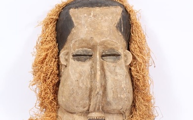 Large African Kakungu Suku tribal polychrome carved Ceremonial Mask with raffia. 32 1/2"H x 20 1/2"W