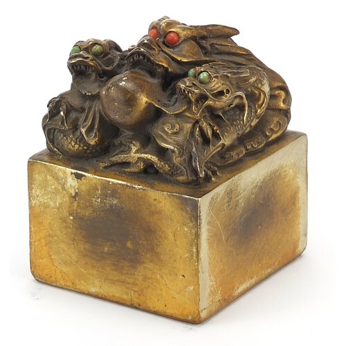 Large Chinese patinated bronze dragon seal paperweight, char...