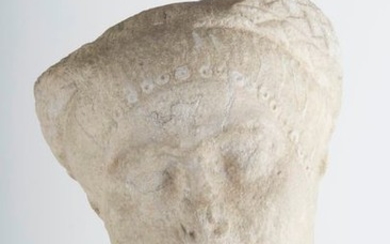 Large marble head of ep. marble head. Beginning...