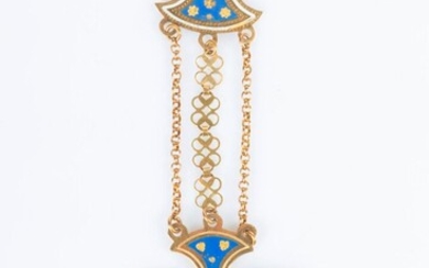 Long pendentif en or émaillé serti d'une pierre orange, chaînettes et pendants mobiles. XIXème siècle...