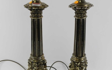 Lot details A pair of large modern gilt metal table...