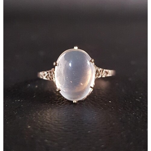 MOONSTONE SINGLE STONE RING the oval cabochon moonstone flan...