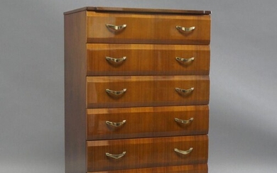 Meredew, a lacquered Afromosia chest of drawers, c.1960, with six drawers, on tapered ebonised supports, 114cm high, 65cm wide, 46.5cm deep