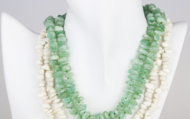 NECKLACE, 2 pcs. irregular white and green polished stones of calcite, among others.