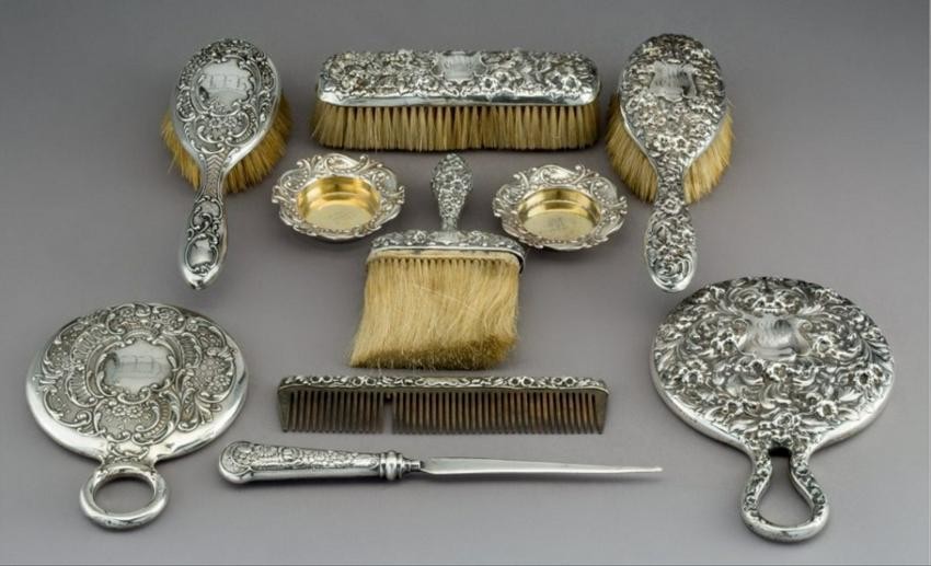 Nine Gorham Repouss Silver Vanity Items With A