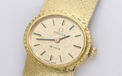 Omega. A lady’s gold oval bracelet watch, Ref. 8228, De Ville, circa...
