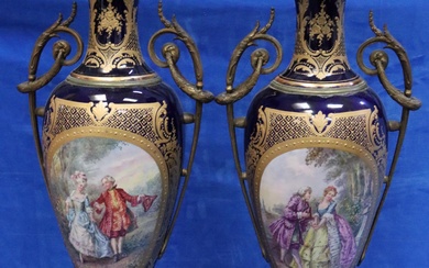 PAIR OF MONUMENTAL MANTLE VASES ATTRIBUTED TO SEVRES, GILT BRONZE MOUNTS AND ONYX BASE, COBALT BLUE GROUND, AND HEAVY GOLD GILT DECORATION, EACH VASE WITH PANELS OF HAND PAINTED