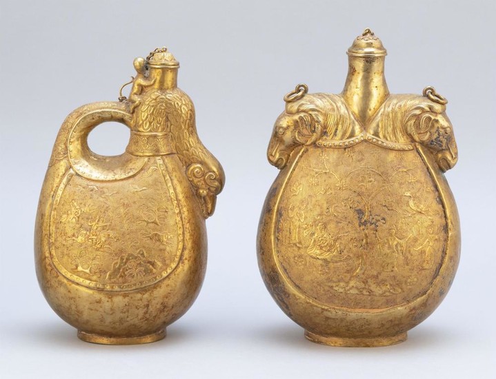 PAIR OF PERSIAN SILVER-GILT PILGRIM FLASKS In bird form, with a monkey at the spout and chased hunt decoration on body. Heights 9.5".