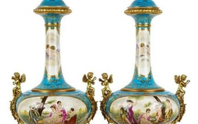 PAIR OF SEVRES STYLE PORCELAIN COVERED VASES