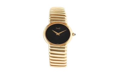 PIAGET. EXTREMELY RARE WOMAN'S 18K YELLOW GOLD.
