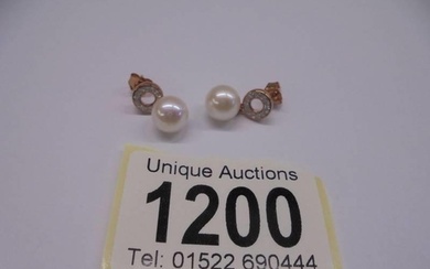 Pair of 9ct rose gold suspended cultured pearl and diamond h...