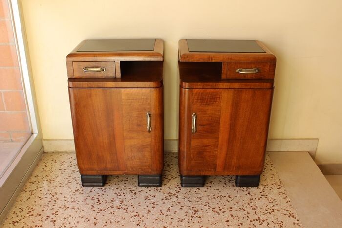 Pair of Art Deco open bedside tables in various essences and black opaline