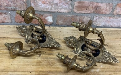 Pair of Regency style gilt cast metal twin branched wall sco...