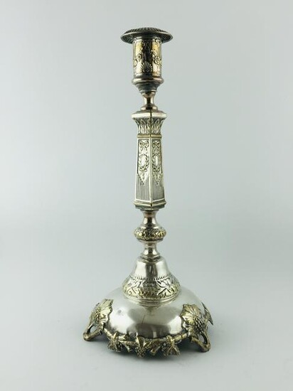 Pair of candlesticks in silver-plated metal