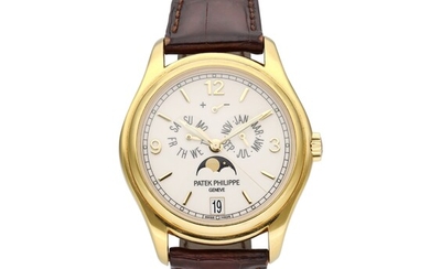 Patek Philippe Reference 5146J-001 | A yellow gold automatic annual calendar wristwatch with moon phase and power reserve indication, Circa 2008