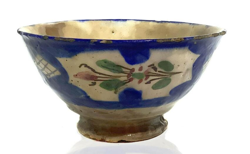 Persian bowl decorated on the outside with floral