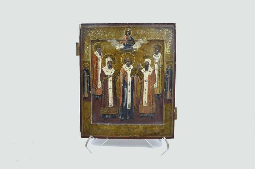 RUSSIAN PAINTED AND PARCEL GILT ICON OF SAINTS