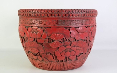 Red glazed Chinese porcelain urn, with raised floral design, mark to rim, Dia42cm, H31cm