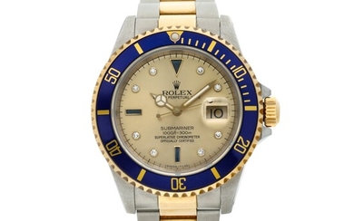 Reference 16613 Submariner A yellow gold and stainless steel wristwatch with date, bracelet and diamond and sapphire-set indexes, Circa 1990