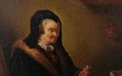 Rembrandt van Rijn (1606-1669), Suiveur de - Une vieille femme avec une bourse et des pièces de monnaie à une table
