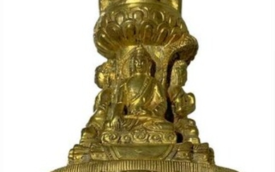 Sculpture in gilted bronze stupa with four small Buddha