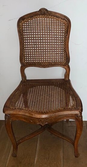Series of six chairs, wickerwork, natural wood, moulded and carved with florets