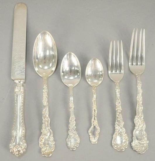 Seventy one piece sterling silver flatware set, to