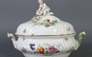 Splendid lidded terrine Meissen, ca. 1756-80, porcelain, glazed and decorated with summer flower bouquets and scattered flowers, decorated with gold, oval form, the walls in relief, the handles in volute form with vegetable applications, the knob as a...