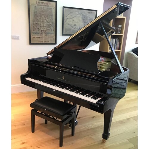 Steinway (c2015) A 6ft 11in Model B grand piano in a bright...