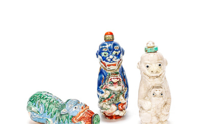 THREE MOULDED PORCELAIN 'BUDDHIST LIONS' SNUFF BOTTLES Late Qing Dynasty
