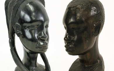 TWO WEST AFRICAN WOOD CARVED BUST SCULPTURES