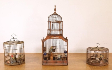 Three birdcages, with contents, h. 79 and diam....