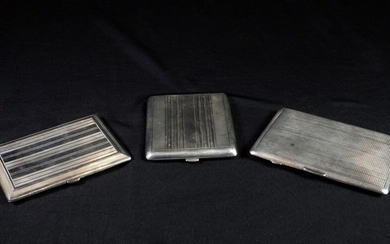Three cigarette cases, one in English silver (minimum 800 thousandths) Gross weight 420 grs.