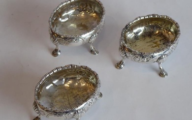 Three hallmarked silver Georgian salts of oval form; repoussÃ©Â...