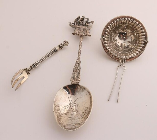 Three parts silver with a reminder spoon with a