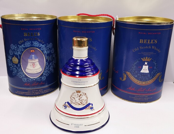 Three unopened Bell's whiskey Royal decanters.