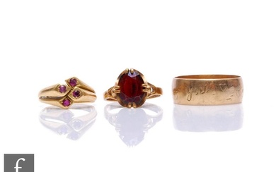 Two 9ct hallmarked rings, a wedding and a garnet single ston...