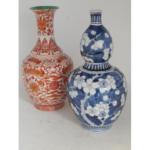 Two Chinese Vases: One Blue & White Double Gourd Measuring 2...