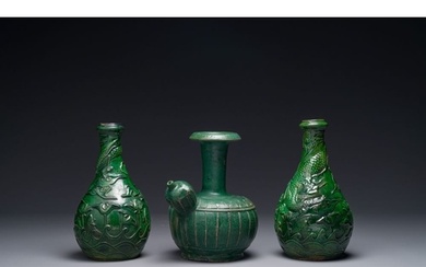 Two Chinese monochrome green-glazed stoneware 'dragon' vases...