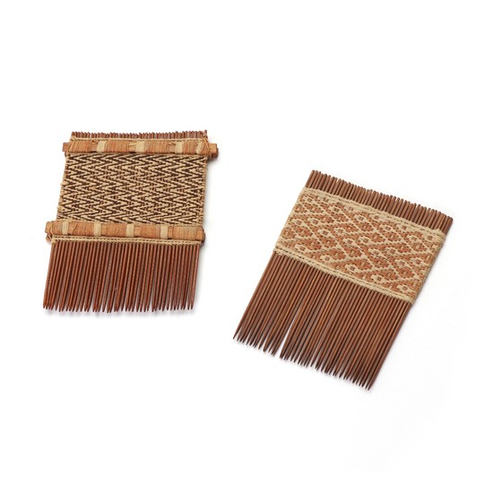 Two Nasca combs adorned with woven textiles in design on bamboo. Peru 400 B.C .- 600 A.D. L. 9–9.5 cm. (2)