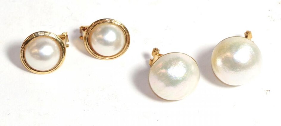 Two pairs of cultured pearl earrings, with post and clip...