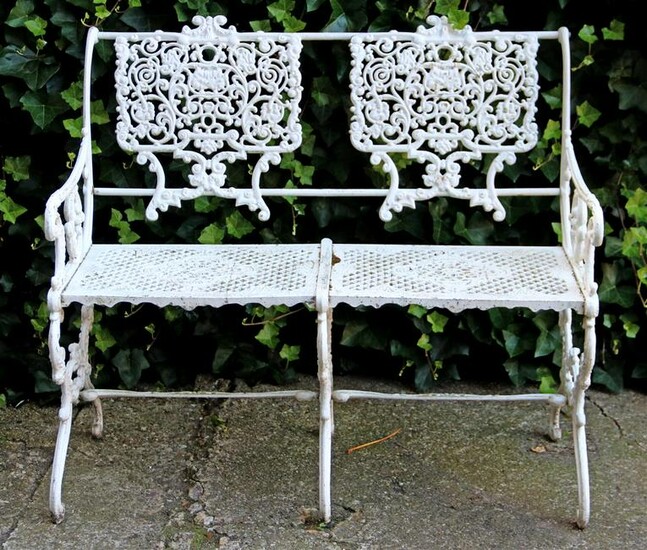 White lacquered wrought iron garden bench with
