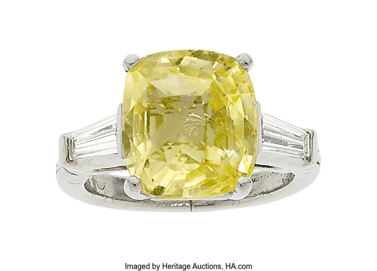 Yellow Sapphire, Diamond, Platinum Ring Stones: Cushion-shaped yellow sapphire...