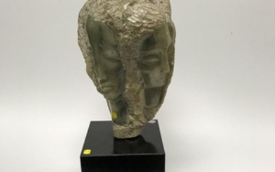 Carved Stone Figural Sculpture with Four Faces
