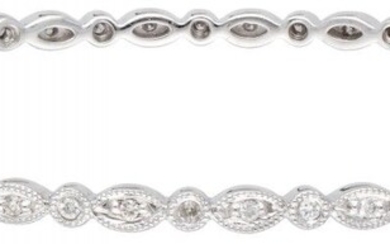 14K. White gold bangle bracelet set with approx. 0.34 ct. diamond in total.