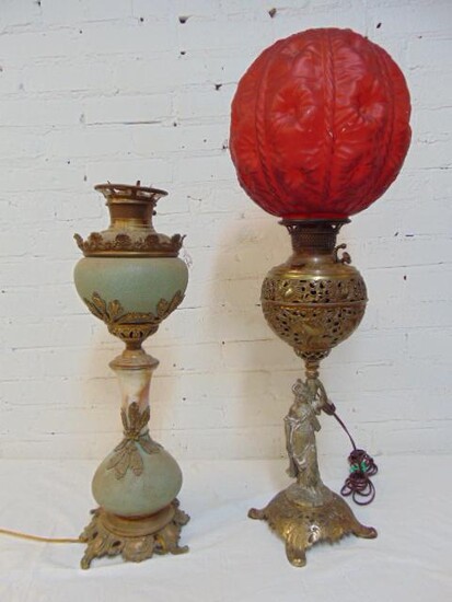 2 oil lamps, figural base with red globe & ceramic &