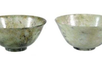 A pair of Chinese green hardstone bowls, with